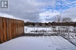 View of yard covered in snow - 