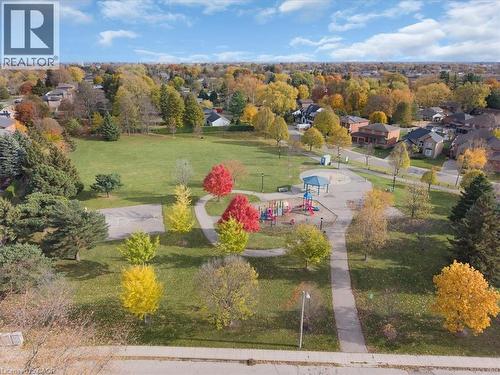 Aerial perspective of suburban area featuring a community park ( Kennedy East Park) and a tree filled landscape - 90 Westlawn Drive, Hamilton, ON - Outdoor With View