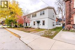 View of front of house featuring stucco siding - 