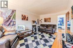 Living area with light wood-style floors - 