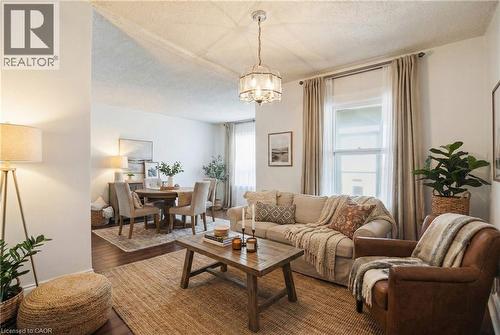 Virtually Staged - 246 Cope Street, Hamilton, ON - Indoor Photo Showing Living Room