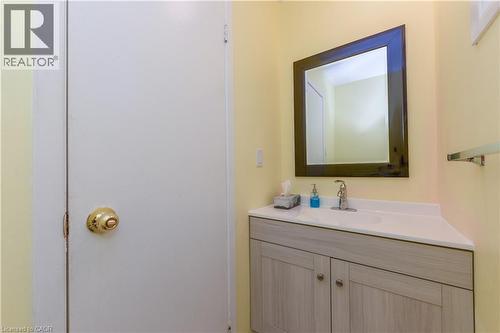 Half bathroom with vanity - 85 Enmount Drive, Brampton, ON - Indoor Photo Showing Bathroom