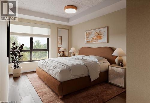 Bedroom featuring wood finished floors and baseboards - 580 Coldstream Drive Unit# 212, Waterloo, ON - Indoor Photo Showing Bedroom