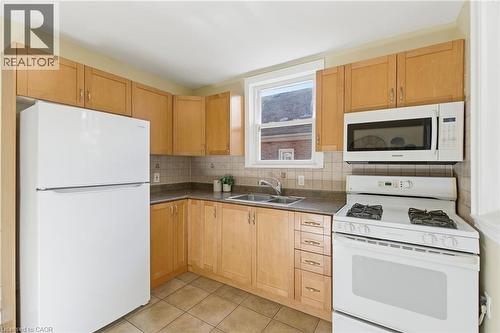76 East 15Th Street, Hamilton, ON - Indoor Photo Showing Kitchen With Double Sink