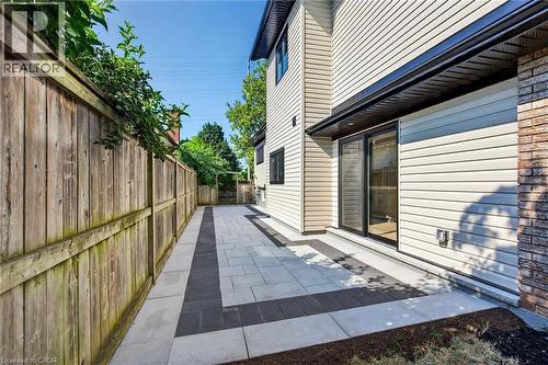 View of home's exterior with a patio area - 4006 Flemish Drive, Burlington, ON - Outdoor With Exterior