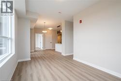 Spare room featuring light hardwood / wood-style floors - 