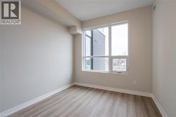 Unfurnished room featuring light hardwood / wood-style floors - 