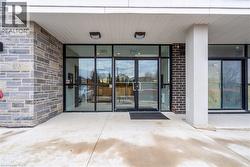Property entrance featuring a patio - 