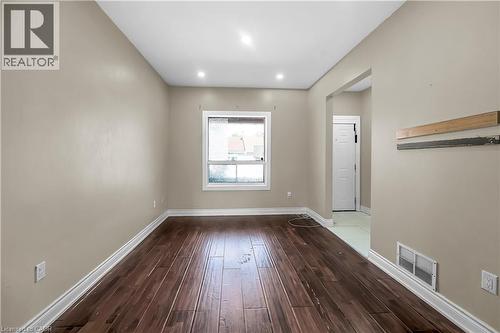 Spare room with wood-type flooring and recessed lighting - 334 Cannon Street E, Hamilton, ON - Indoor Photo Showing Other Room