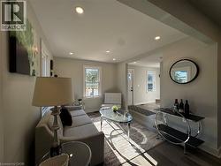 Living area featuring recessed lighting and wood finished floors - 