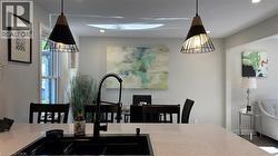 Dining area featuring recessed lighting - 