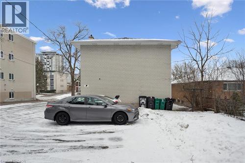 View of snow covered parking area - 24 Austin Drive, Waterloo, ON - Outdoor