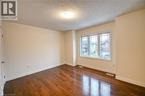 4th - 130 Coopershawk Street, Kitchener, ON - Indoor Photo Showing Other Room