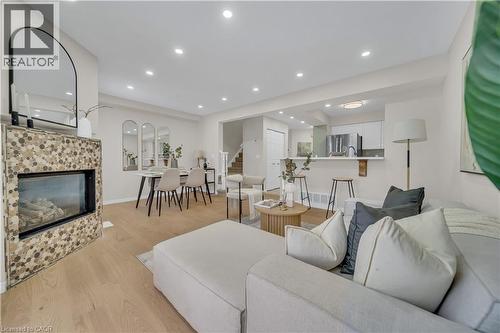 540 Mariner Drive, Waterloo, ON - Indoor Photo Showing Living Room With Fireplace