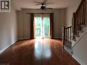 Spare room with wood finished floors, ceiling fan, and stairway - 4294 Ingram Common, Burlington, ON  - Indoor Photo Showing Other Room 