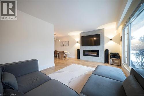 2 Grenada Drive, Simcoe, ON - Indoor Photo Showing Living Room With Fireplace