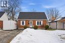 Cape cod house with a shingled roof and brick siding - 157 Bridgeport Road E, Waterloo, ON  - Outdoor 