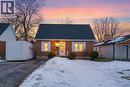 New england style home featuring brick siding, roof with shingles, and a chimney - 157 Bridgeport Road E, Waterloo, ON  - Outdoor 