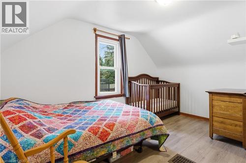 Bedroom with light wood-style flooring and vaulted ceiling - 157 Bridgeport Road E, Waterloo, ON - Indoor Photo Showing Bedroom