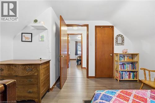 Bedroom featuring lofted ceiling and wood finished floors - 157 Bridgeport Road E, Waterloo, ON - Indoor Photo Showing Other Room