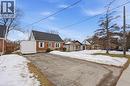 View of front facade featuring brick siding and a shingled roof - 157 Bridgeport Road E, Waterloo, ON  - Outdoor 