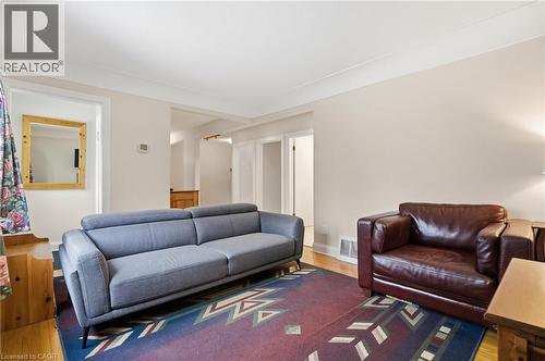Living area with wood finished floors and baseboards - 157 Bridgeport Road E, Waterloo, ON - Indoor Photo Showing Living Room