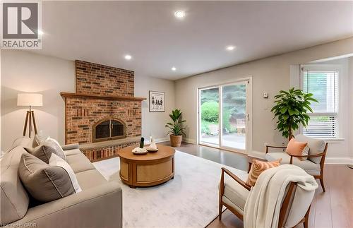 Virtually Staged - 2 Morningview Place, Kitchener, ON - Indoor Photo Showing Living Room With Fireplace