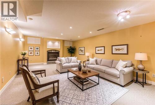 Virtually Staged - 2 Morningview Place, Kitchener, ON - Indoor Photo Showing Living Room With Fireplace