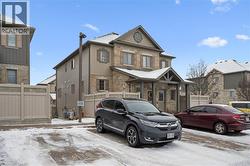 View of front facade with stone siding - 