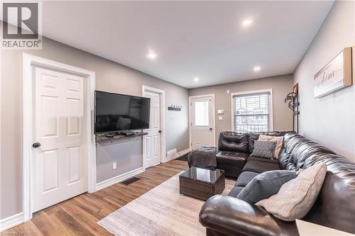 Living area featuring light wood finished floors and recessed lighting - 140 Royal Avenue, Hamilton, ON - Indoor Photo Showing Living Room