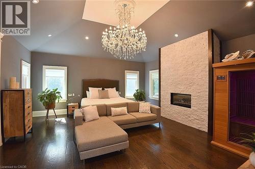 Gas fireplace and Sauna! - 4180 Lakeshore Road, Burlington, ON - Indoor Photo Showing Living Room With Fireplace