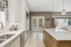 Direct Walk-out to outdoor patio, kitchen - 