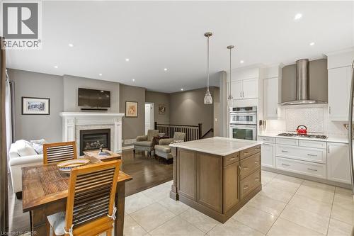 21 Tulip Tree Road, Niagara-On-The-Lake, ON - Indoor Photo Showing Kitchen With Fireplace With Upgraded Kitchen