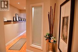 Bathroom with light wood-style floors and recessed lighting - 