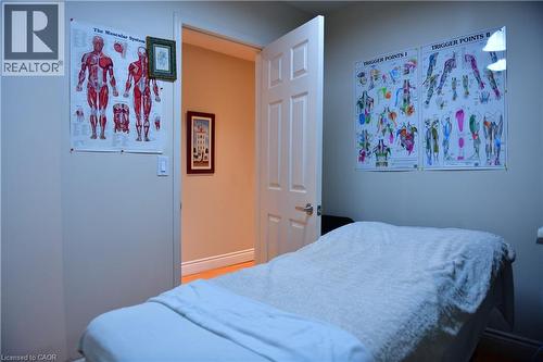 Bedroom featuring baseboards - 265 Queen Street S, Mississauga, ON 