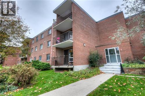 View of apartment building / complex - 4 Avalon Place Unit# 103, Kitchener, ON - Outdoor With Balcony With Exterior