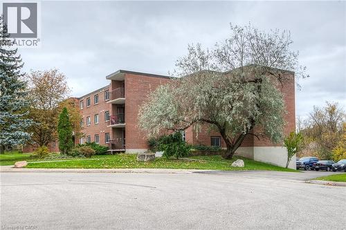View of apartment building / complex - 4 Avalon Place Unit# 103, Kitchener, ON - Outdoor With Balcony