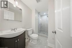 Full bath with vanity and a shower stall - 