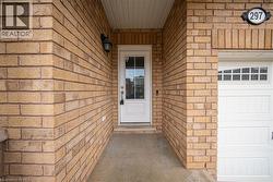 Entrance to property featuring brick siding - 