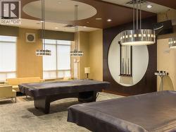 Game room with billiards, recessed lighting, and carpet - 