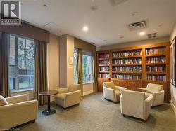 Living area featuring carpet flooring and recessed lighting - 