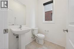 Bathroom with baseboards and toilet - 