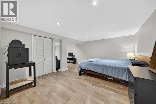 Bedroom featuring a closet, light wood-style floors, and recessed lighting - 421 East 36Th Street, Hamilton, ON - Indoor Photo Showing Bedroom