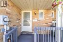 View of exterior entry with brick siding and a porch - 419 Downsview Place, Waterloo, ON  - Outdoor With Exterior 
