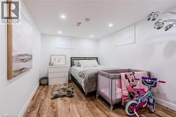 Bedroom featuring wood-type flooring and recessed lighting - 