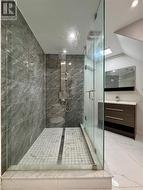 Bathroom featuring vanity, recessed lighting, marble finish floor, and a stall shower - 