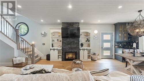 33 Cedar Drive, Turkey Point, ON - Indoor Photo Showing Living Room With Fireplace