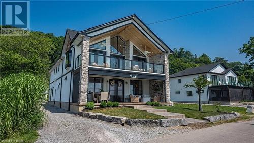 33 Cedar Drive, Turkey Point, ON - Outdoor With Facade