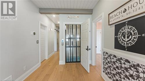 Elevator - 33 Cedar Drive, Turkey Point, ON - Indoor Photo Showing Other Room