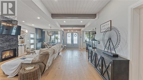 33 Cedar Drive, Turkey Point, ON - Indoor Photo Showing Other Room With Fireplace